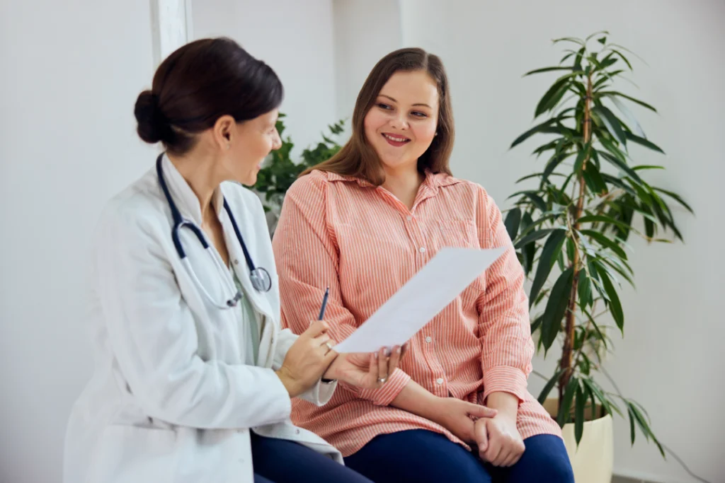 A doctor discussing Wegovy treatment with a patient during a professional consultation.