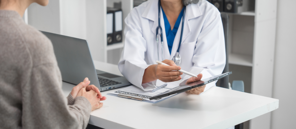 Doctor consulting a woman during Women's Health Month.